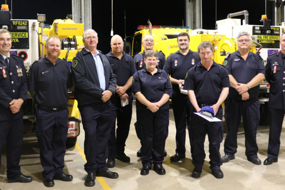 At the Cambooya Fire Station on Monday night following the presentation (from left) Queensland Fire and Emergency Services (QFES) Acting Superintendent John Welke, Cambooya Rural Brigade Volunteers Scott Woodhouse, Ron Spoelder, Peter Cook, Allan Bellingham, Marilyn Greer, Adam Carney, Ronald Fiechtner and Garry Greer and QFES Chief Superintendent Jason Lawler.