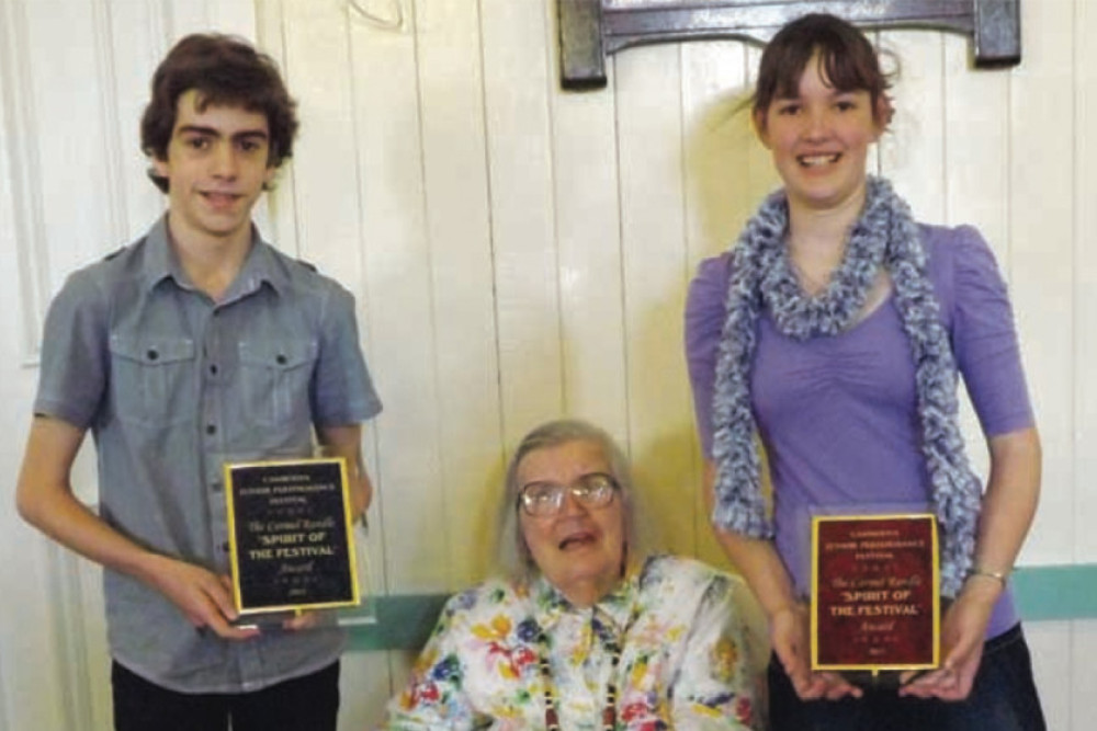 At the final Cambooya Junior Performance Festival, Male Spirit of the Festival award winner Jeremy Gray, festival founder the late Carmel Randle and Female Spirit of the Festival award winner Emma Hoey.