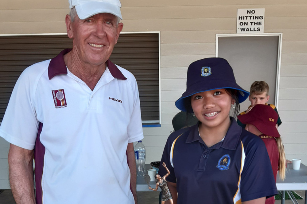 Bruce Von Hoff presents the 2023 Neil Boyes Junior Encouragement Award to Thrishia Dugyon at last Tuesday’s junior tennis break-up.