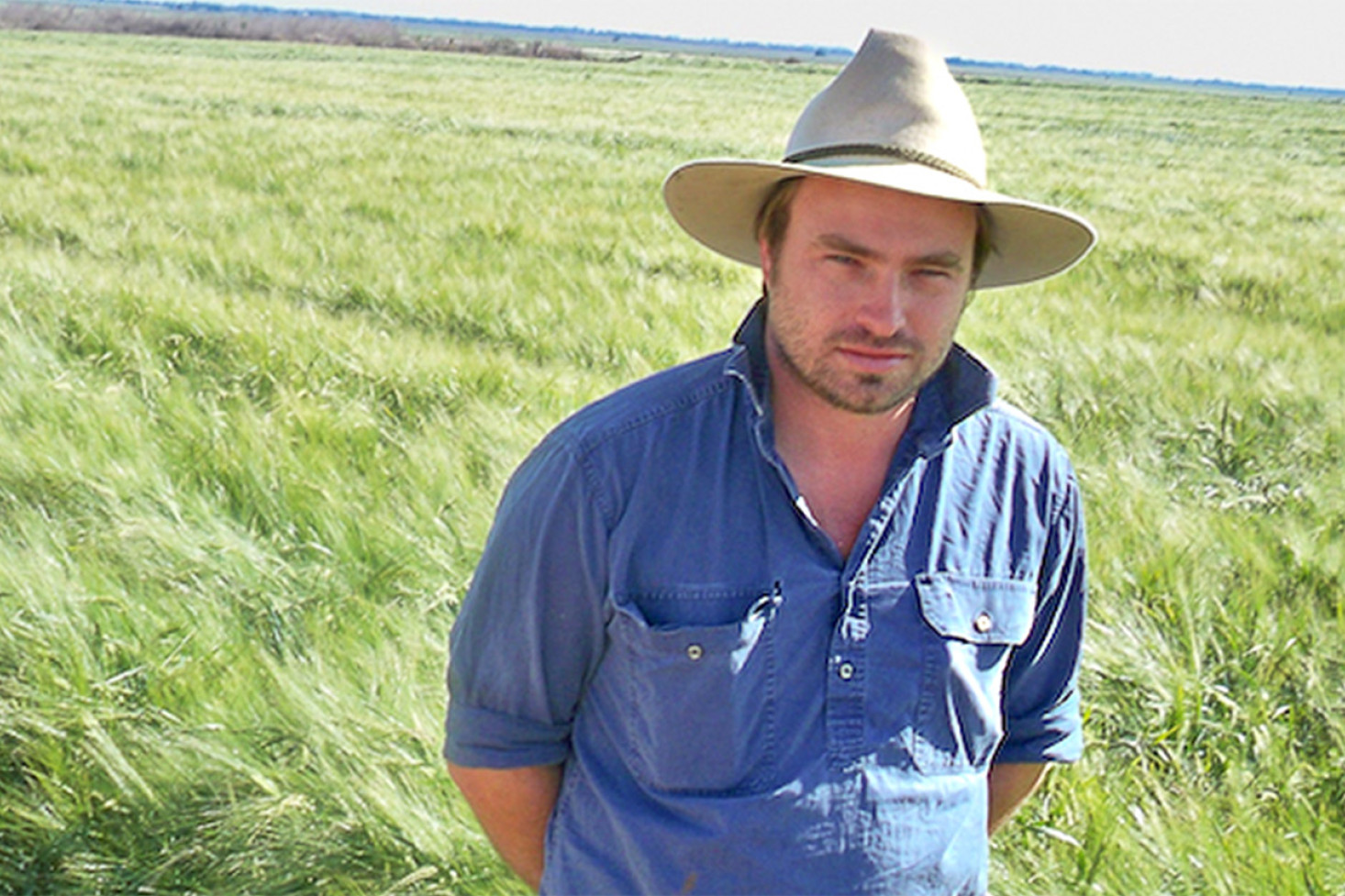 John Kummerow of Bowenville inspecting his magnificent winning barley crop of Fandaga.