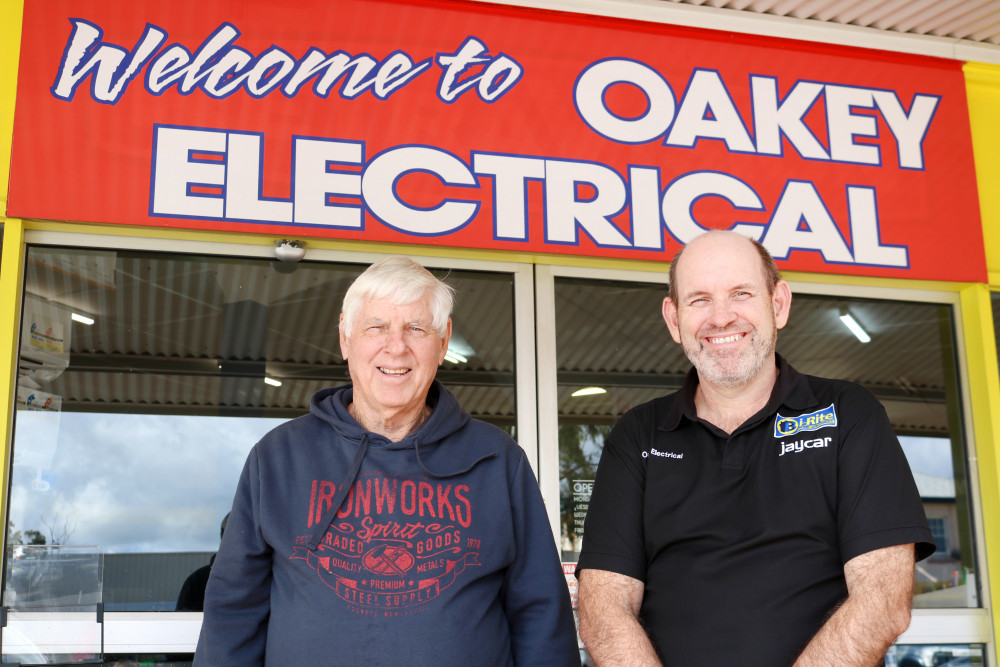 Peter and Andrew Langton celebrate the 50 years of Oakey Electrical.