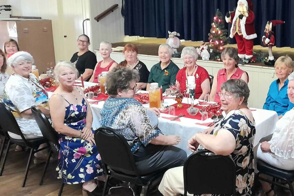 The QCWA ladies enjoy their Christmas lunch.