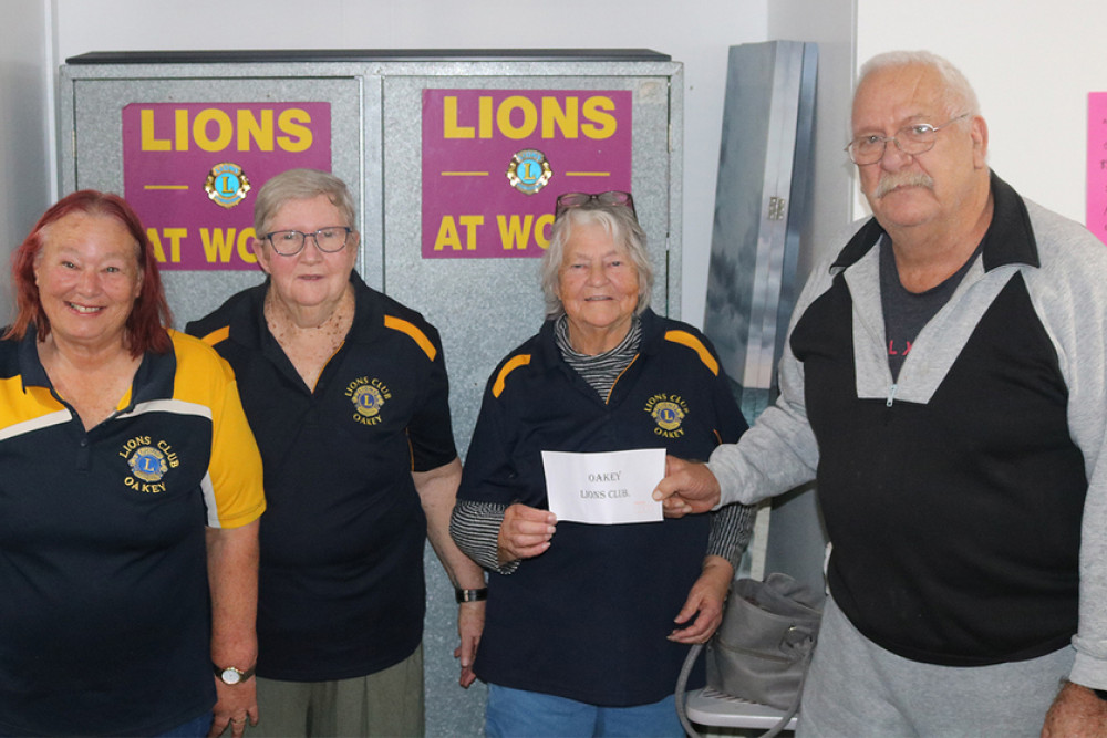 TOP RIGHT: Oakey Lions executive members Caroline Engle, Julie Ernst and Lois Thorne with the Tavern’s John Webster.