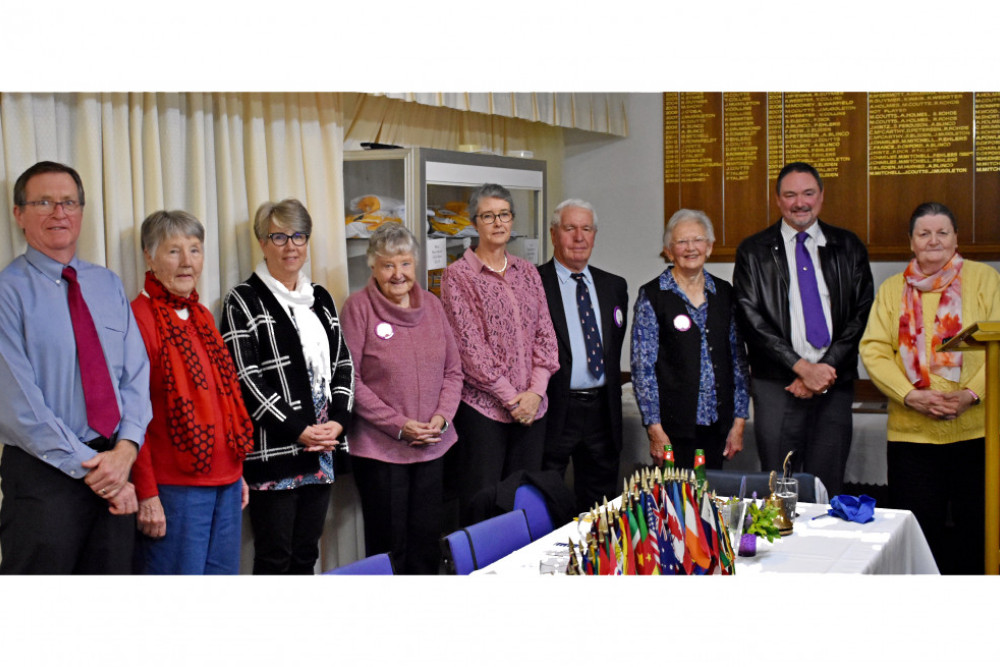 New Lions Club executive. Past District Governor Bev Bates installs incoming committee members (from left) John Murphy, Carol Shipley, Mim Shipley, Yvonne Cornford, Deanne Olischlager, John Dade, Wilma Proudlock and David Olischlager.