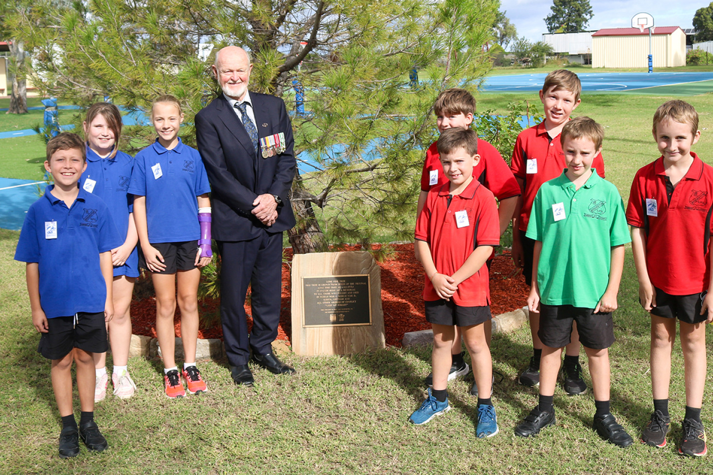 ABOVE: Biddeston State School’s Year 5 and 6 leaders, showed Mr Cass the school’s Lone Pine tree where this year’s Biddeston ANZAC Day Dawn Service will be held.