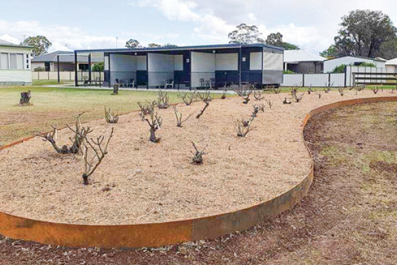 The Arthur Ezzy Memorial Rose Garden has been successfully relocated.