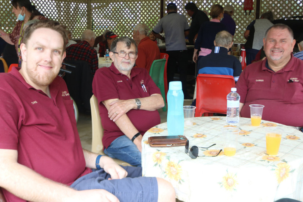 Local volunteers enjoying a barbecue lunch with McDonald House residents.