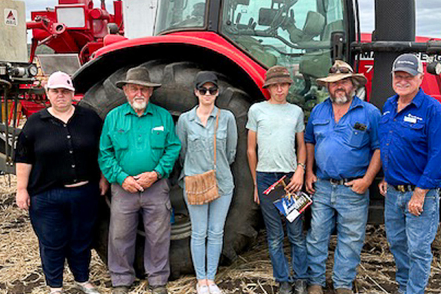 Pacific Seeds Territory Manager Bill Smith (far right) joins the Mengel family, from left, Renee, Melvin, Aimee, Cameron and Joshua.