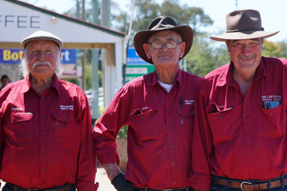 Millmerran Men’s Shed members ran a sausage sizzle on Friday as buskers performed along the Main Street of town ahead of the Australian Camp Oven Festival