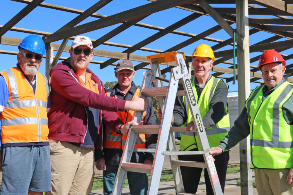 Oakey Men’s Shed members working to remove the hardwood frame include Graeme Garvis, Chris Gorton, Lex Hudson, Arthur Wingett and John Greenhalgh.