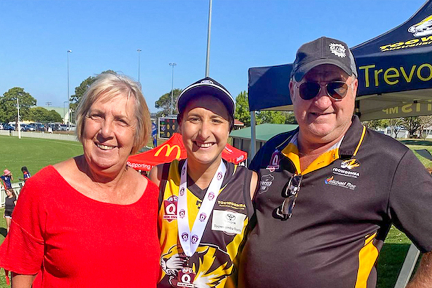 RIGHT: Carlee Mesken with her parents Glenys and Dale Mesken.