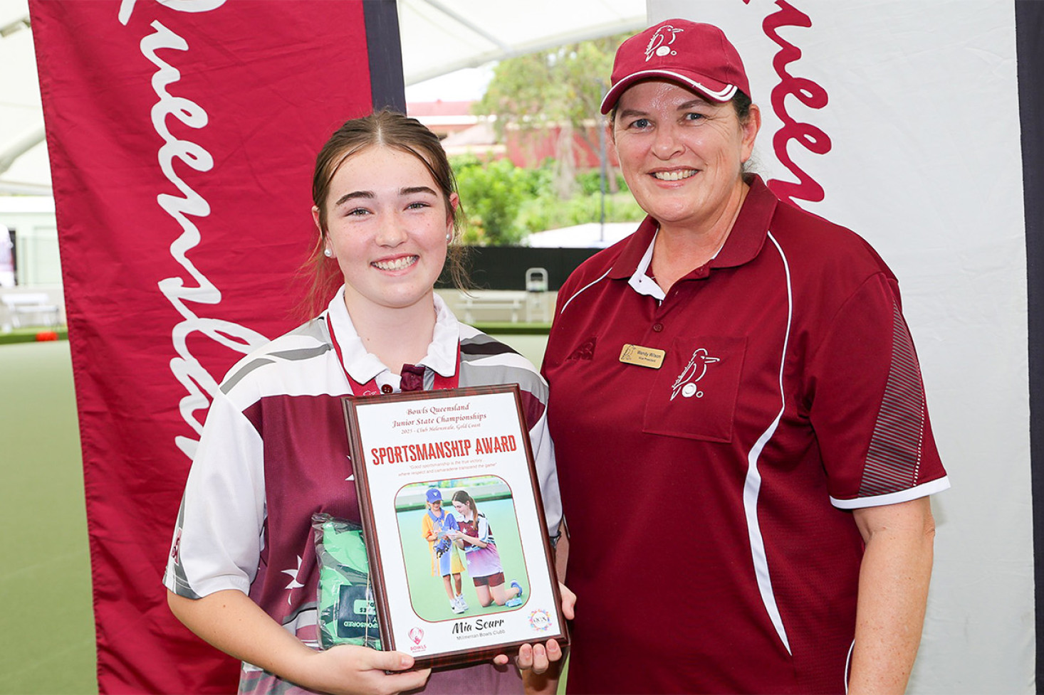 Mia Scurr was presented with a commemorative plaque by BQ Vice President Wendy Wilson for her sportsmanship toward the younger players. Photo, Bowls Qld