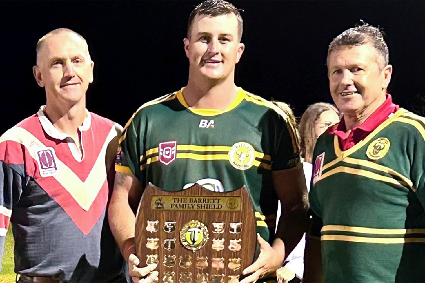 Wattles 2024 Club Captain and victorious first grade skipper and Ty Gardner accepts the 32nd Barrett Family Shield from family members Michael Barrett and Glen Hamblin at Platz Oval last year.