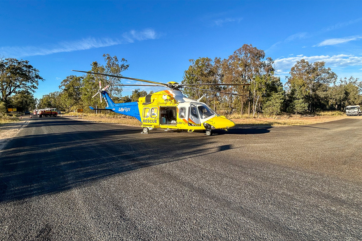 The Toowoomba-based LifeFlight helicopter landed on a stretch of road north-west of Millmerran on Monday morning to fly a young man with pelvic injuries to hospital, after two vehicles collided. Photo, LifeFlight
