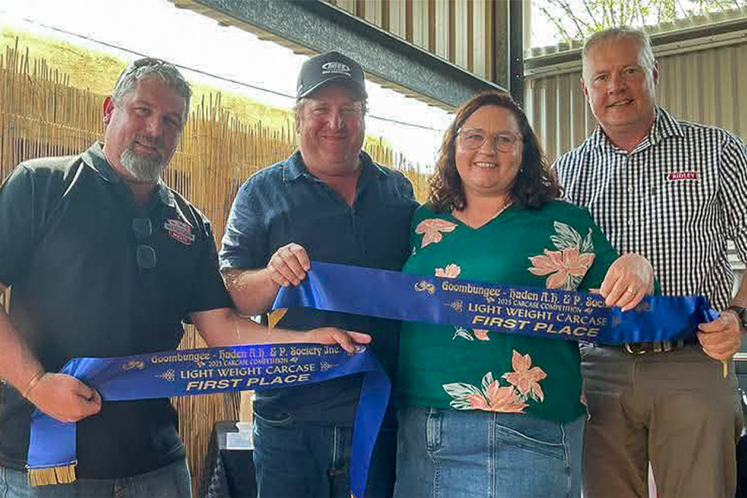 Cory Schilf, with Lightweight Carcase hook winners Scott and Tanya Duncombe from Cooyar, and sponsor Hein Pretorius.