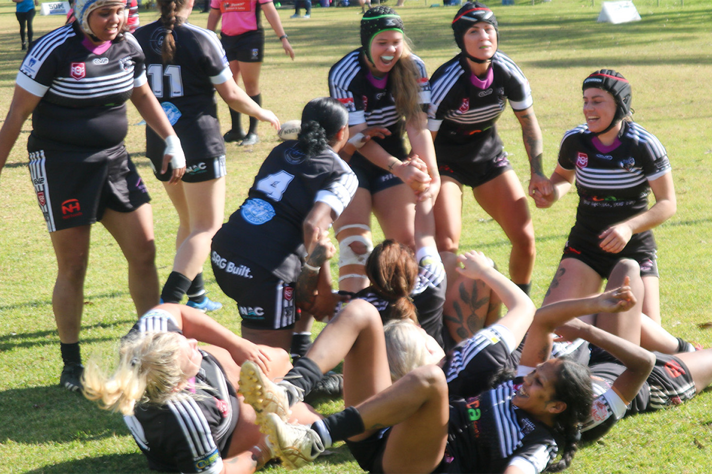 The Oakey Bears women’s players are jubilant after Tamika Clevin’s game winning-try in the eighth minute of golden point extra-time.