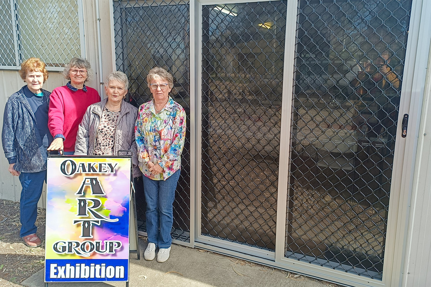 Oakey Art Group Members Rosalind Mason, Cora Grundy, Kathy Brownsdon and Di Anderson with their new door at the studio on Stanley St.