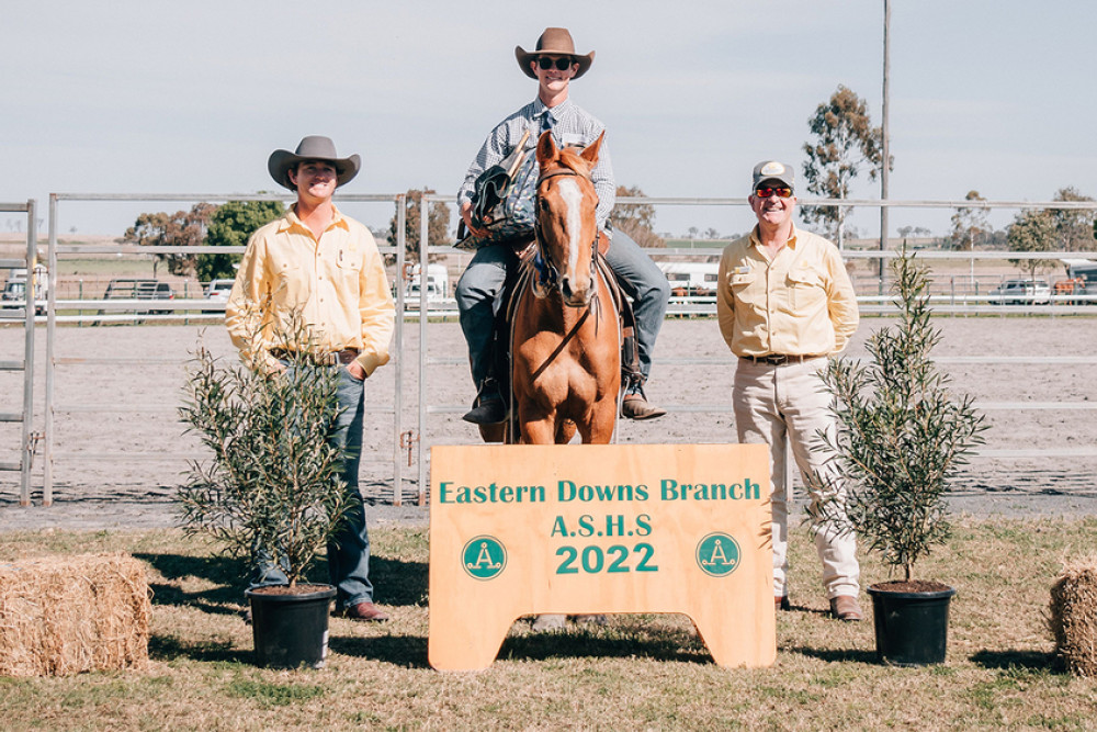 Open Challenge winner Darcy Flamsteed with major sponsor representatives Andrew Dunn and Ben Johnston of Ray White Rural Warwick and Ray White Livestock Warwick. Photo: Paige Wilson Photography