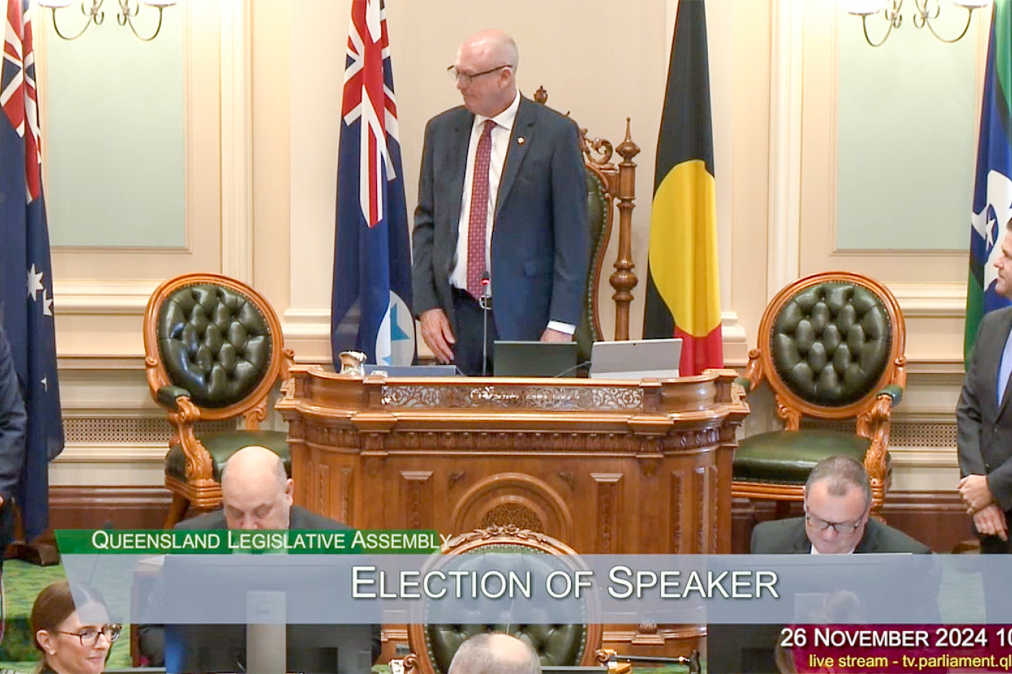 Condamine MP Pat Weir upon being elected as Speaker, flanked by Premier David Crisafulli (left) and Deputy Premier Jarrod Bleijie (right).