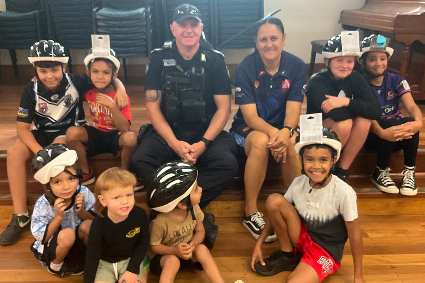 Along with offenders, James Leahy handed out helmets to the PCYC Oakey Connect kids.