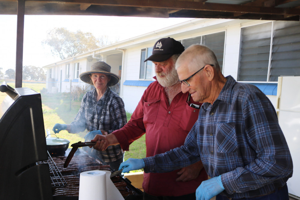 Oakey Urban Landcare members Trisha Parks, Brett Evans and Hilton Jeffrey showcase their expert barbecuing skills.