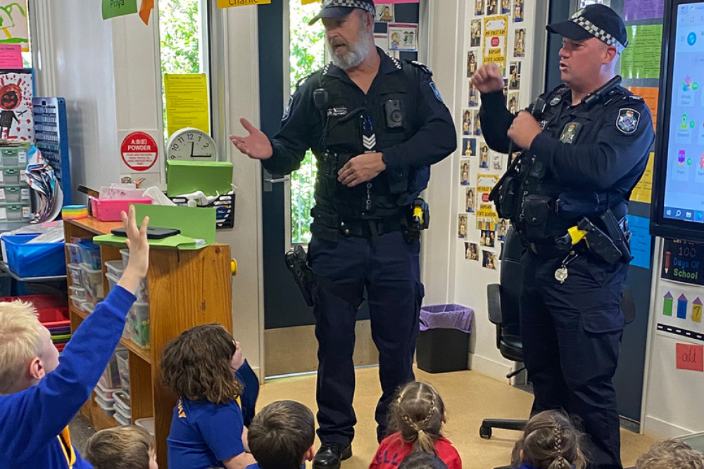 Constable Stu and Jason talking to some of the Ramsay younger students.