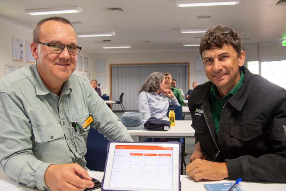 Director of the Centre for Crop Health Professor Levente Kiss shows Matthew Skerman from Nutrien AgSolutions the new app at a recent workshop hosted at USQ.