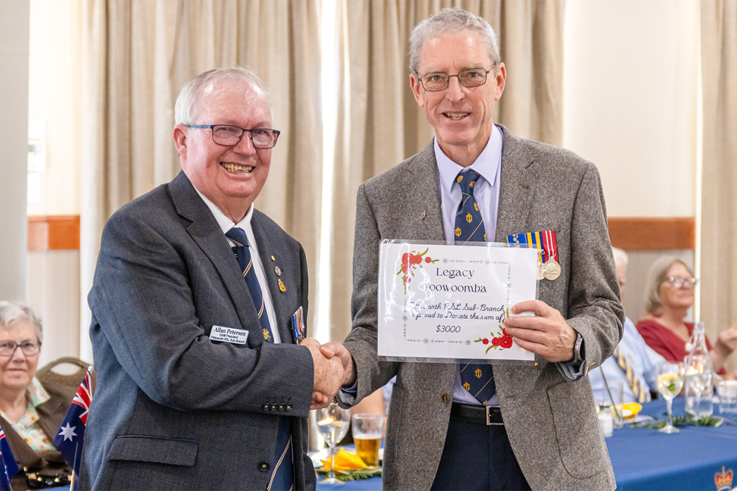 Jock Crocombe (right) received a certificate from Pittsworth RSL Sub-Branch President Allan Petersen (left), in recognition of the $3000 the Sub-Branch has donated to Toowoomba Legacy, which support partners and children of veterans across the Downs including Pittsworth, Millmerran and Oakey. Photo, Casey Byford Photography