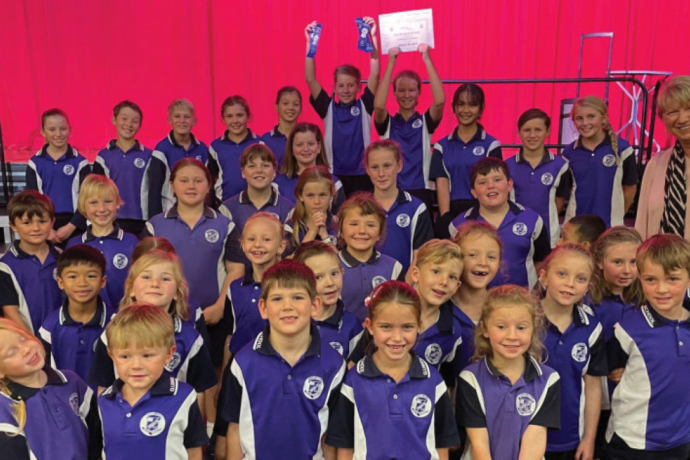 The high achieving Quinalow State School choir with teacher Ruth Watts.