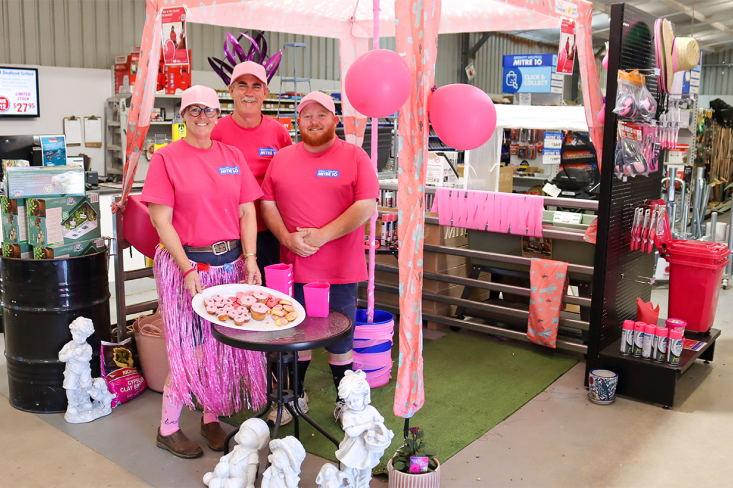 RAFF staff, Kate, Reg and Red get behind the fundraising day for the McGrath Foundation by wearing their best pink.