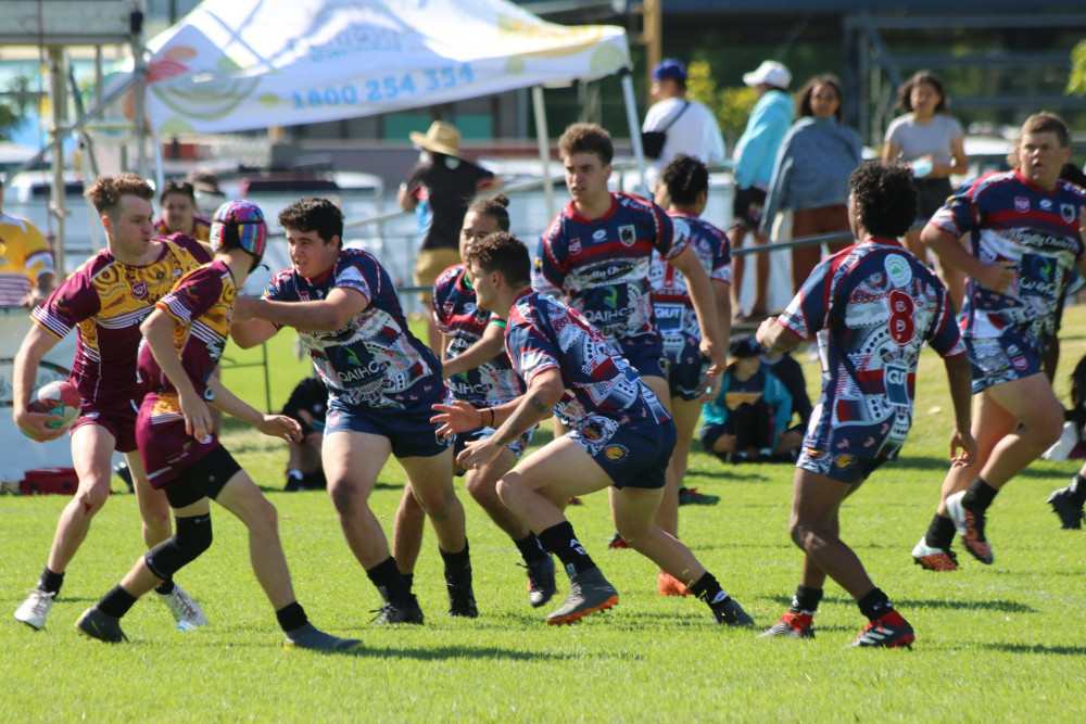 Oakey Redbelly Blacks Under 18 players Kaleb Stanton and Terrell Anderson look to tackle and opposing player at the Murri Carnival last month. - Photo, Simone Cooper Stanton