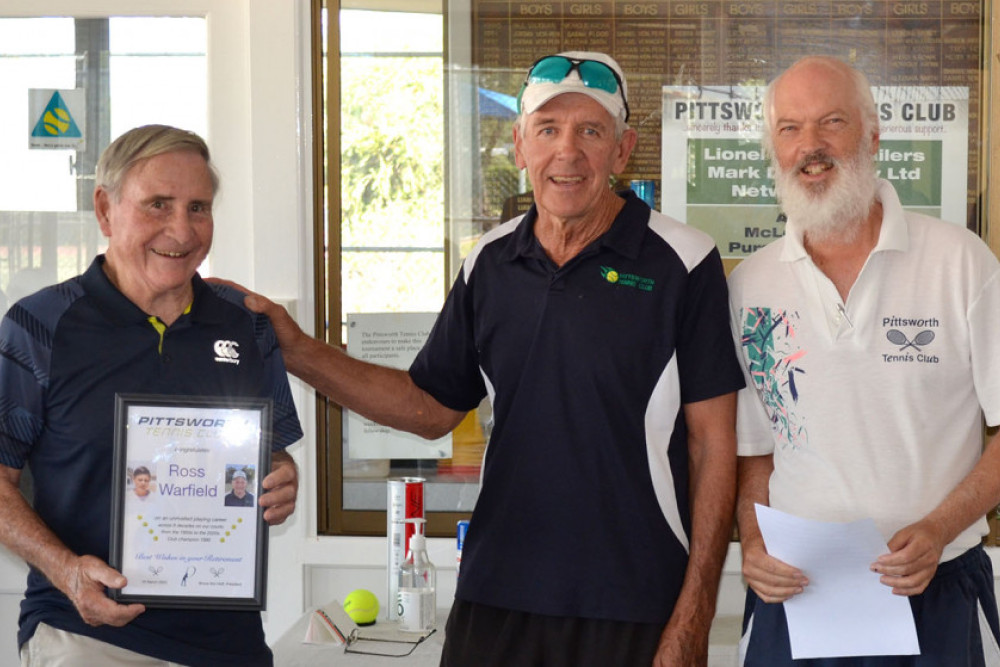 So many happy returns! Stalwart Ross Warfield receives a certificate honouring his long playing career from Pittsworth Tennis Club president Bruce Von Hoff and vice-president Alastair Silcock.