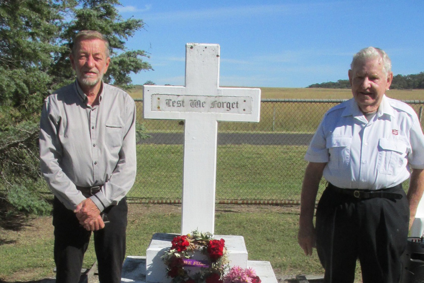 Salvation Army representative Robert Marshall (right) conducted the service, and his audio assistant Trevor Neale laid a wreath in memory of the fallen.