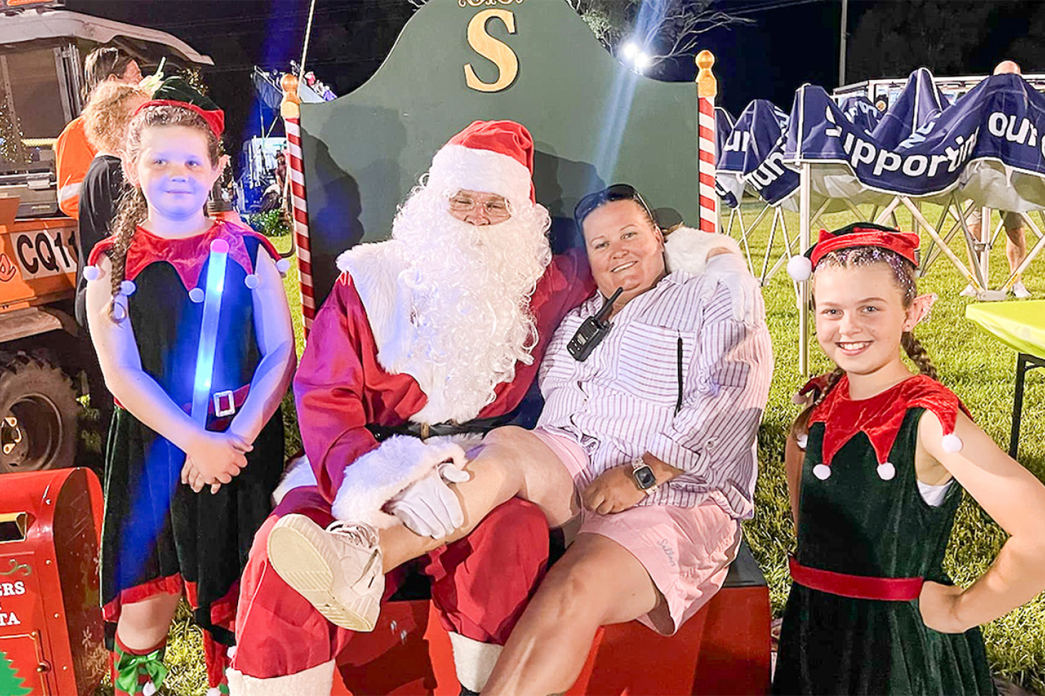 Elf Charlie Rowett with Santa Claus, ‘Mumma Elf’ Sam Kennedy and Elf Catherine Nelson.