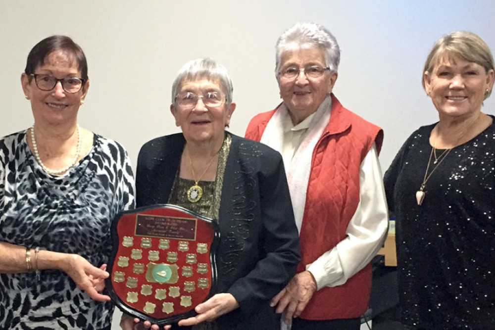 Jan Beecham National President presents the Elsie Ker and Gerri Price Perpetual Trophy to Daphne Whatley, Margaret Darr and Jill\_Bockman.