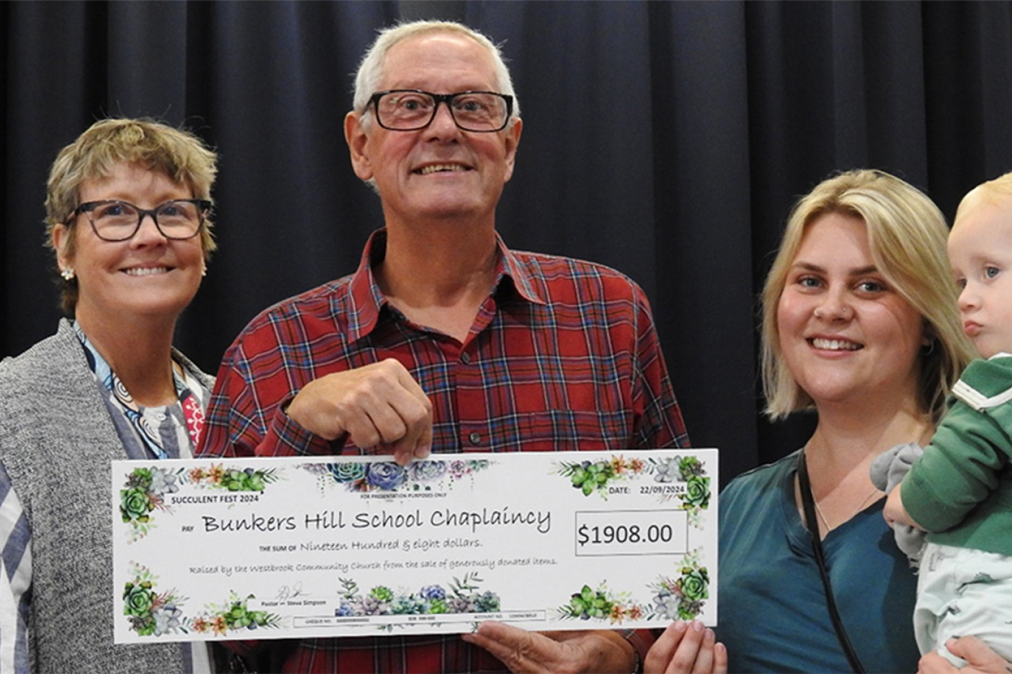 At thee cheque presentation at Bunker’s Hill State School assembly last Monday morning, from left, Bunker’s Hill State School Principal Sharon Wilson, Pastor Steve Simpson from the Westbrook Community Church, Bunker’s Hill State School Chaplain, Amber Carroll and son, Jackson.