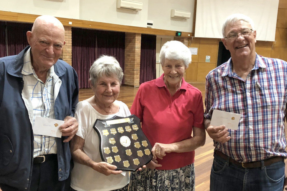 The team that won the Pivot Shield was (from left) Eric Folker, Alma Fowler, Sue Buckel and Hugh Miller.