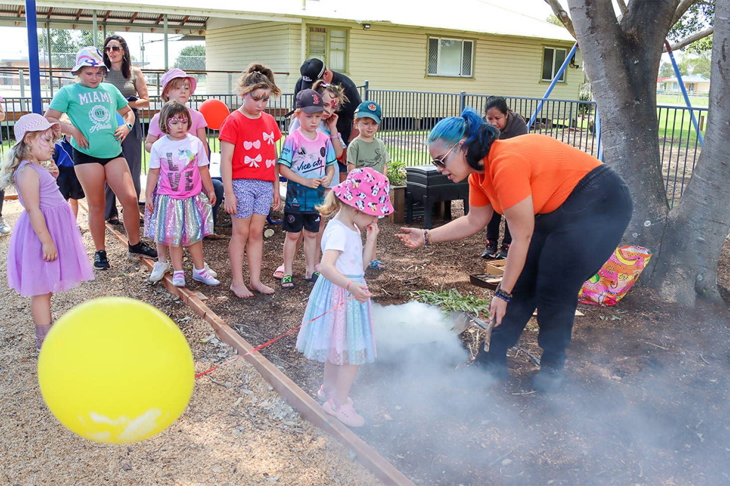 A smoking ceremony was part of the celebration and while the youngsters may not have understood its significance, they were certainly intrigued. Geneene Meijer of the Western Wakka Wakka people performed the ceremony.