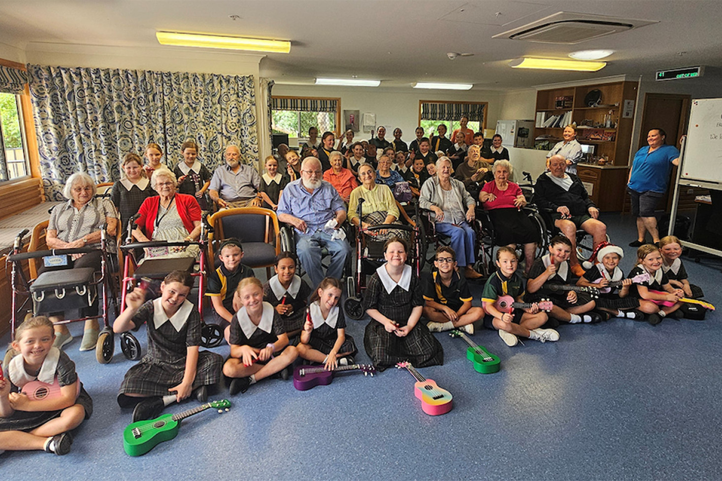 St. Monica’s School Choir and ukulele ensemble with McLean Care CWA House residents. Photo, Allyson Gardener