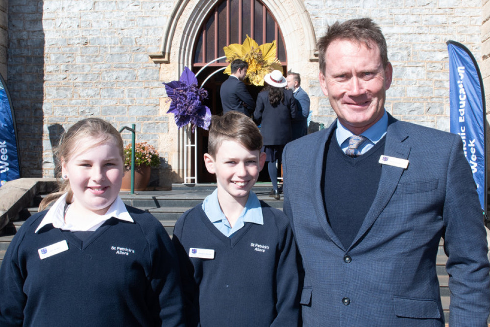 Catholic Education Week Launch in Toowoomba - students volunteered to attend and represent Allora St Patrick’s School. Mili W. and Douglas E. with the Principal Keith Blaikie.