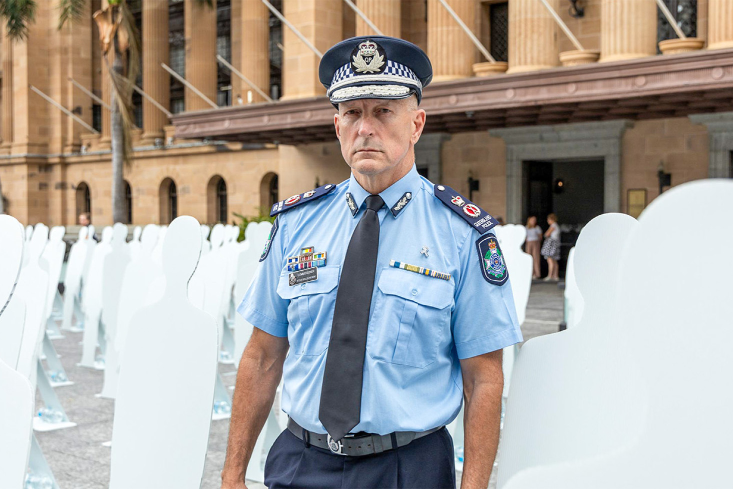 Police Commissioner Steve Gollschewski with the sihlhouettes representing road deaths.