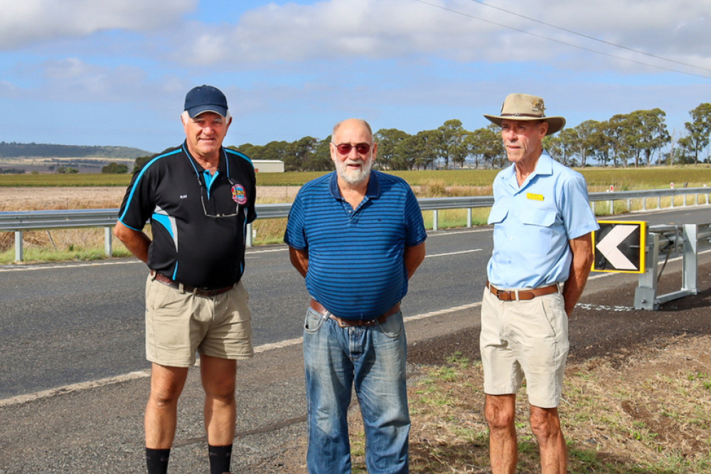 TARMAC Vice President Ray Baines, member Ian Claydon and Chief Flight Supervisor Trevor Theodore worry that the new guard rails installed at the entrance to their facility will increase the likelihood of a road accident.