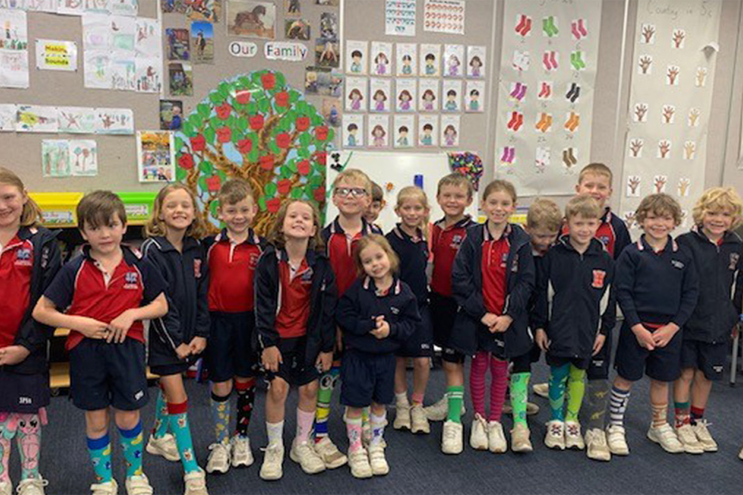 St Pat’s Year 1/2 class named Cunningham. These young students are happy to show off their colourful socks, worn as part of a fundraiser for Catholic Mission’s Socktober.