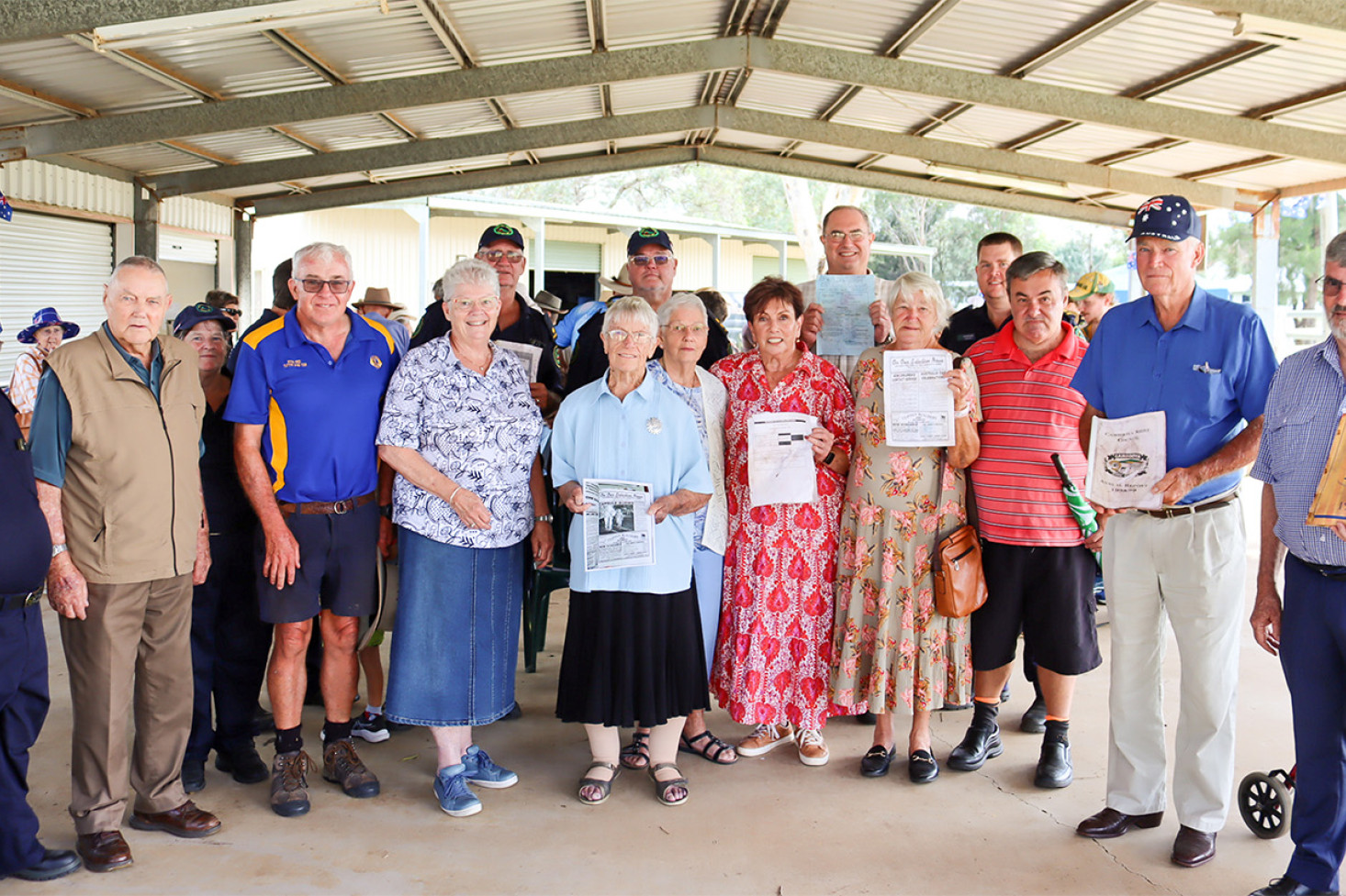 Members of the Cambooya district community who were there for the time capsule’s burial in 2000 take a look at its contents.