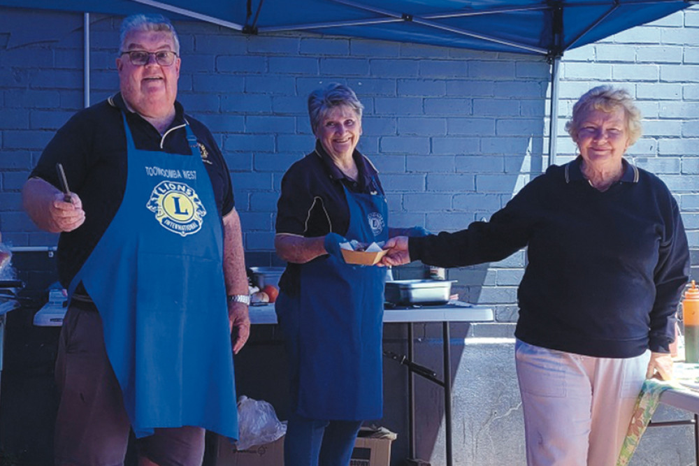 Lions Derek Tuffield, Cheryl Orton and Elaine Nosse man the barbecue, providing a much appreciated meal.