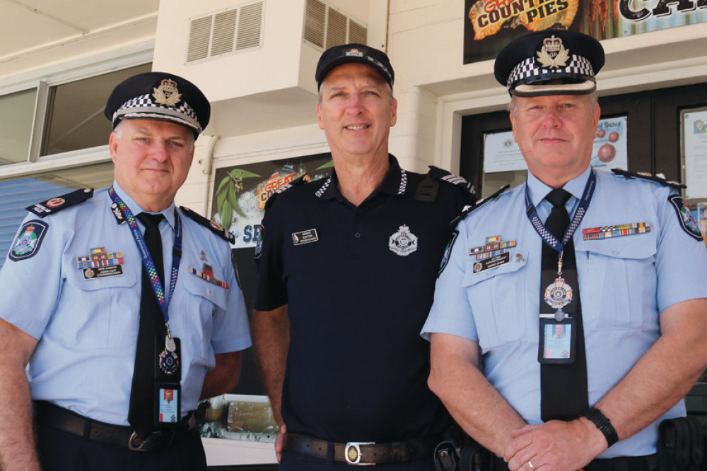 Queensland Police Assistant Commissioner Southern Region Mike Condon (left) and Acting Superintendent Danny Shaw (right) meets with local residents and Oakey Police Officer-in-charge Sergeant John Cook on Monday.