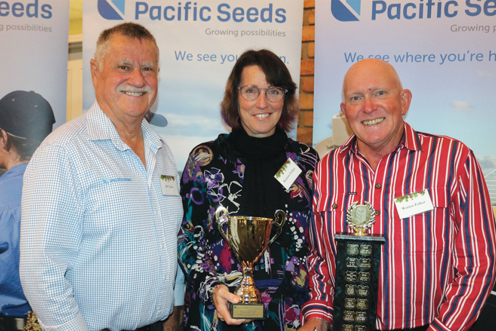 Trial Cooperator of the Year Award was awarded to Kaylene And Warren Folker of Wyreema, joined by Bill Smith from Pacific Seeds (left),