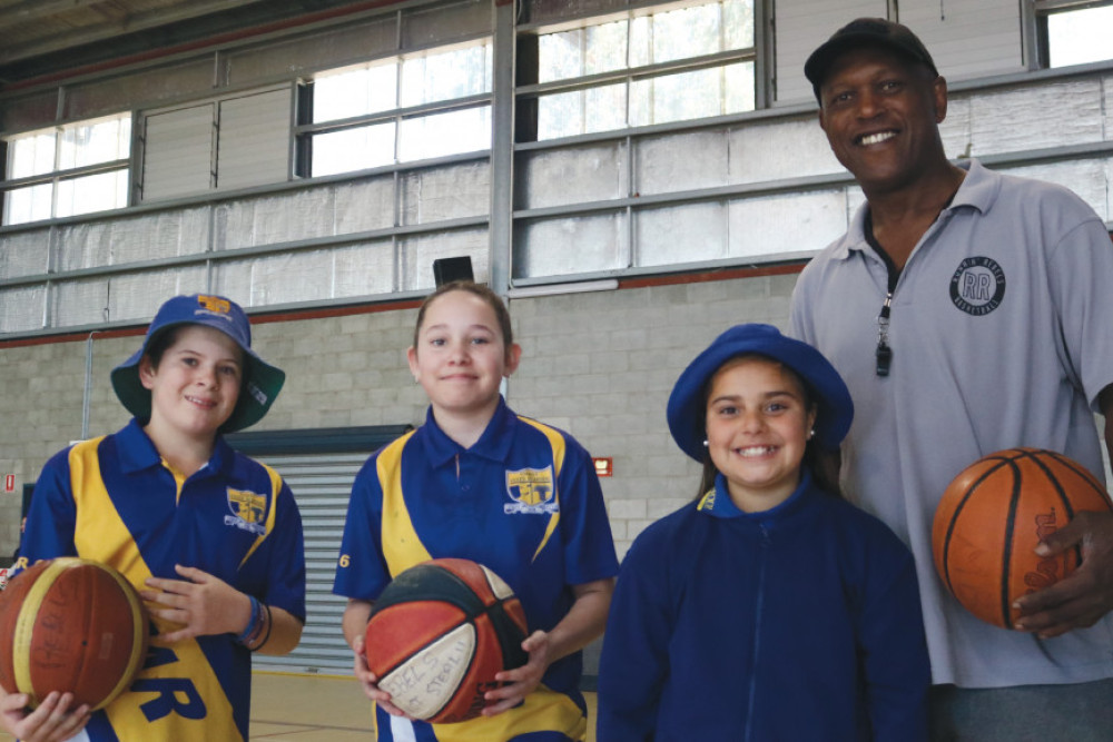 Local basketball legend Pop Dickerson worked with the students to better their ball skills.