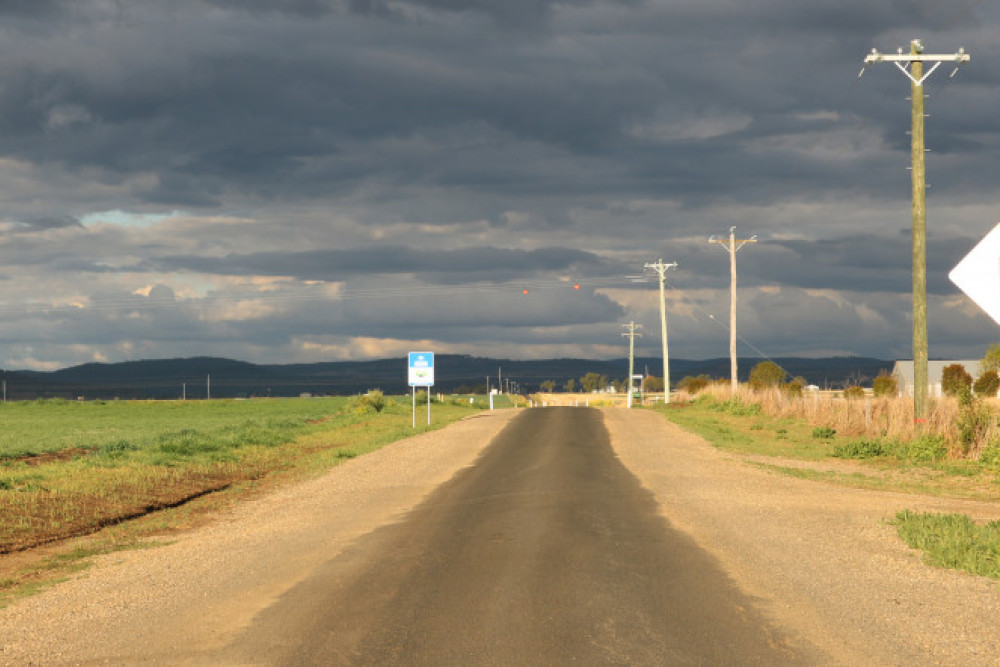 A section of Upper Spring Creek Road, near its intersection with the New England Highway, that has recently been repaired.