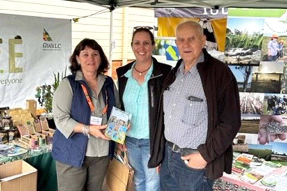 Many local community groups work together to maximise their volunteers. At the Toowoomba World Environment Day, from left, Mary-Lou Gittins (CCMA), Rebecca Kirby (Landcare Officer) and Hugh Krenske (Friends of the Escarpment Parks Toowoomba) showcasing the Allora Landcare Bird Book latest edition.